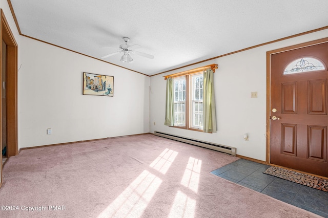 carpeted entrance foyer featuring crown molding, a baseboard heating unit, a ceiling fan, vaulted ceiling, and a textured ceiling