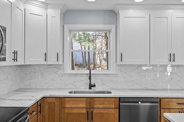 kitchen with a sink, stainless steel dishwasher, backsplash, and light stone countertops