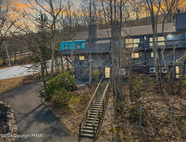 view of property at dusk