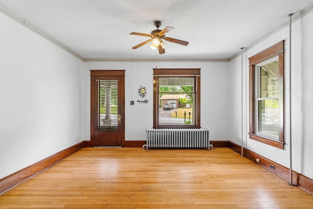100 Mahoning Dr E, Lehighton, PA 18235 - entryway with radiator heating unit, ceiling fan, light wood-style flooring, and ornamental molding