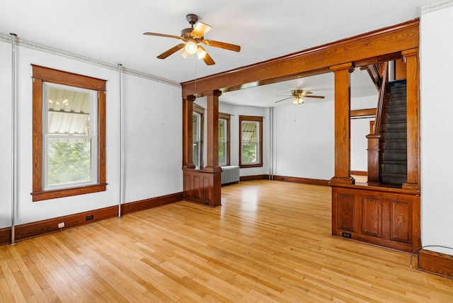 100 Mahoning Dr E, Lehighton, PA 18235 - unfurnished room featuring radiator heating unit, a ceiling fan, healthy amount of natural light, light wood finished floors, and crown molding