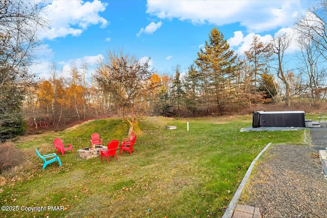 view of yard with an outdoor fire pit