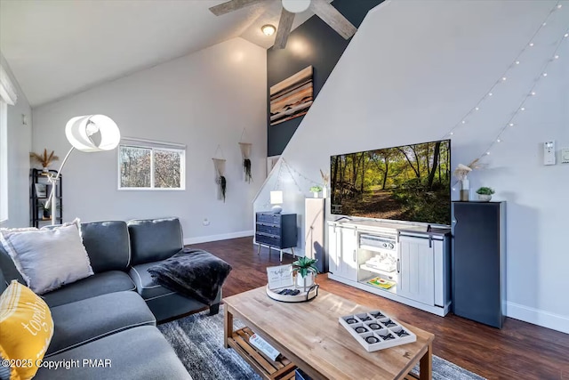 living area with high vaulted ceiling, a ceiling fan, baseboards, and wood finished floors