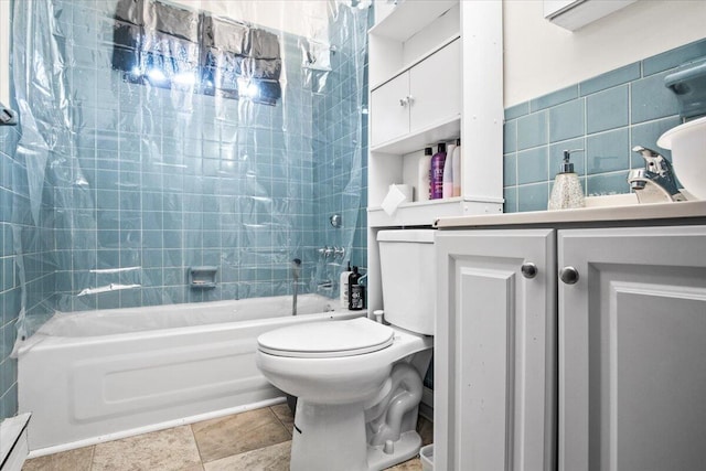 8062 Red Squirrel Dr, Tobyhanna, PA 18466 - full bath with tasteful backsplash, toilet, tub / shower combination, vanity, and tile patterned floors