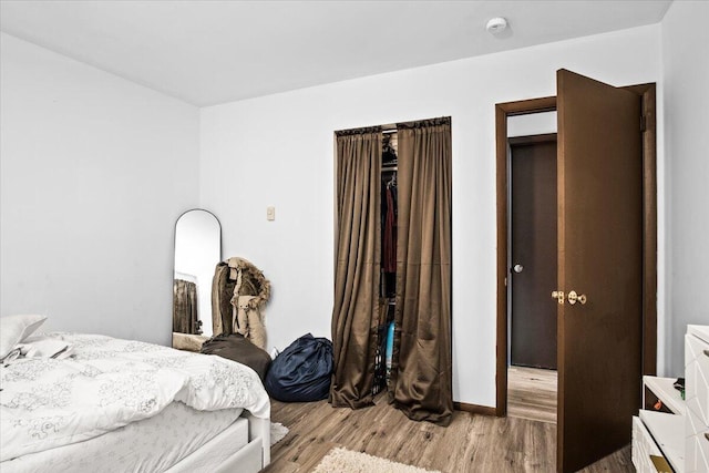 8062 Red Squirrel Dr, Tobyhanna, PA 18466 - bedroom with baseboards and wood finished floors