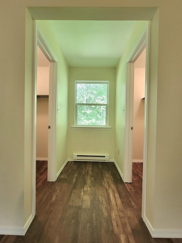 1169 Hunters Woods Dr, East Stroudsburg, PA 18301 - corridor with a baseboard heating unit, dark wood finished floors, and baseboards