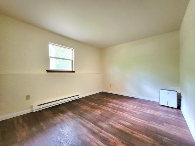 1169 Hunters Woods Dr, East Stroudsburg, PA 18301 - empty room with baseboard heating, dark wood-style flooring, and baseboards