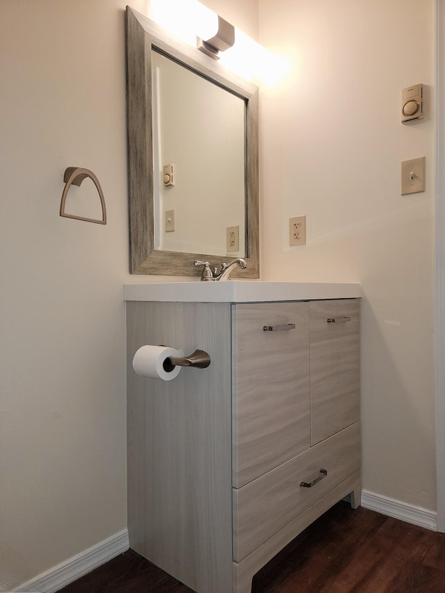 1169 Hunters Woods Dr, East Stroudsburg, PA 18301 - bathroom with baseboards, vanity, and wood finished floors