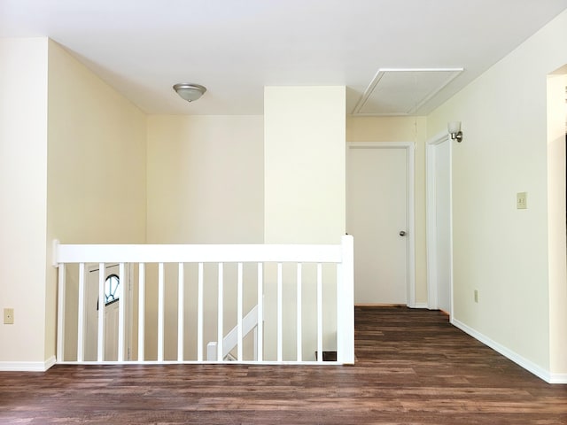 1169 Hunters Woods Dr, East Stroudsburg, PA 18301 - hall with attic access, wood finished floors, an upstairs landing, and baseboards