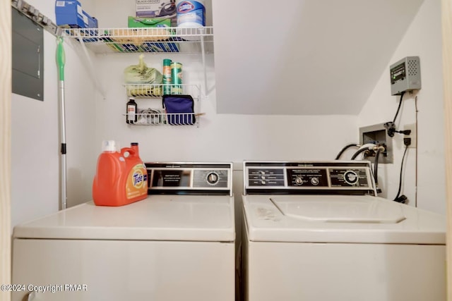 laundry room with washer and dryer and laundry area