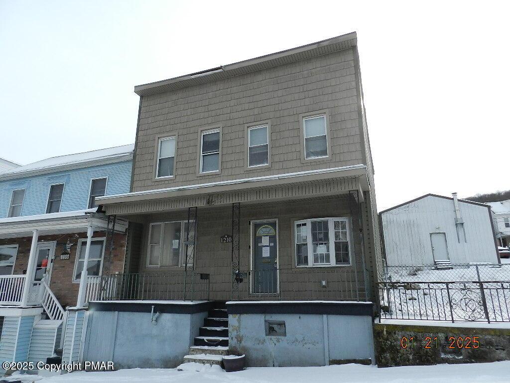 view of front of property with covered porch