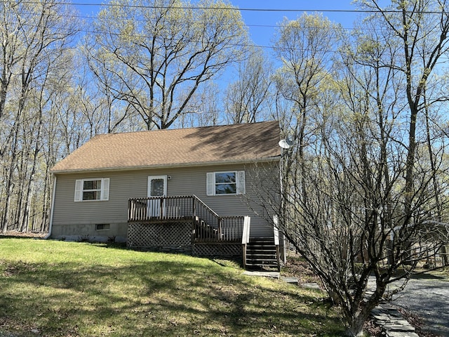 1227 Alder Rd, East Stroudsburg, PA 18302 - rear view of house with a lawn, a deck, stairway, and a shingled roof