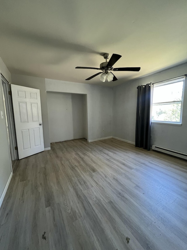 1227 Alder Rd, East Stroudsburg, PA 18302 - unfurnished bedroom with a closet, a ceiling fan, wood finished floors, and baseboards