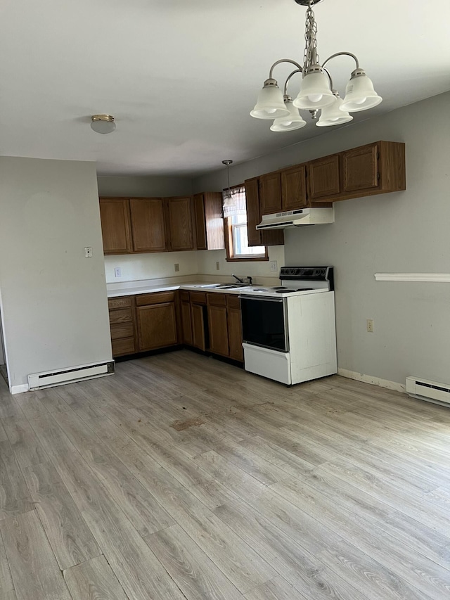 1227 Alder Rd, East Stroudsburg, PA 18302 - kitchen with white range with electric cooktop, under cabinet range hood, baseboard heating, light wood finished floors, and a notable chandelier