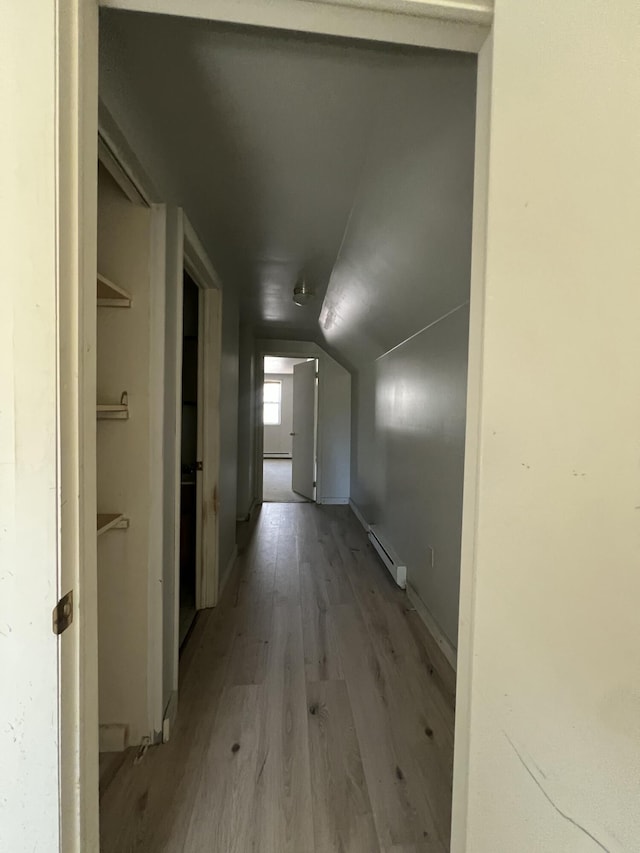 1227 Alder Rd, East Stroudsburg, PA 18302 - corridor with vaulted ceiling, light wood finished floors, and baseboard heating