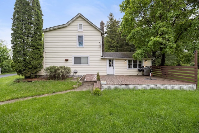 349 Carlton Rd, Mount Pocono, PA 18344 - rear view of property with a deck, a chimney, and a lawn