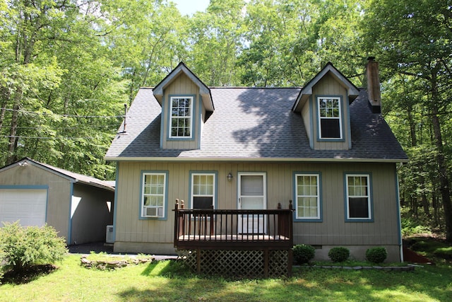 5147 Arrowhead Ln, East Stroudsburg, PA 18302 - view of front facade featuring a chimney, an outbuilding, a front yard, and a detached garage