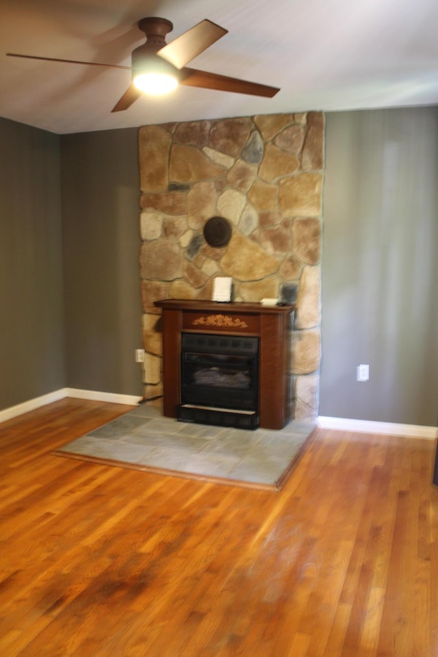5147 Arrowhead Ln, East Stroudsburg, PA 18302 - detailed view of a ceiling fan, a fireplace, and wood finished floors