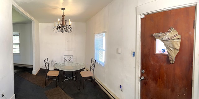 247 Buck Blvd, White Haven, PA 18661 - dining room featuring a baseboard radiator, a chandelier, and a wealth of natural light