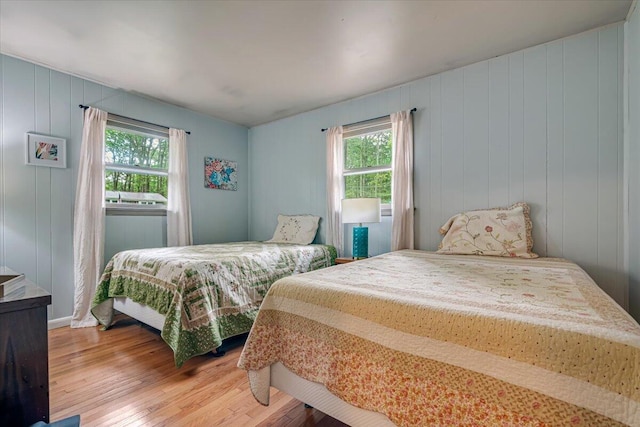 275 Selig Rd, Pocono Lake, PA 18347 - bedroom featuring wood finished floors and multiple windows