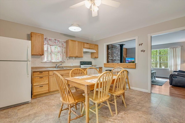 275 Selig Rd, Pocono Lake, PA 18347 - dining area featuring ceiling fan and a baseboard radiator
