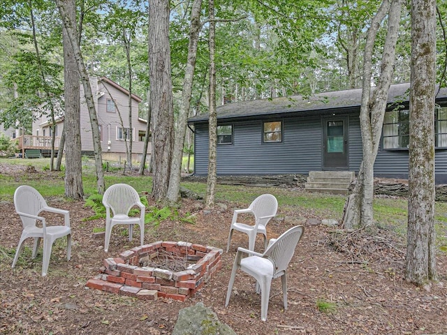275 Selig Rd, Pocono Lake, PA 18347 - view of yard featuring a fire pit and entry steps
