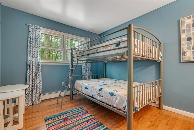 275 Selig Rd, Pocono Lake, PA 18347 - bedroom with a baseboard radiator and wood finished floors