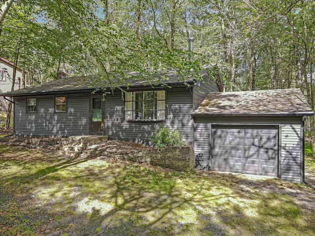 275 Selig Rd, Pocono Lake, PA 18347 - view of front of home with a chimney and roof with shingles
