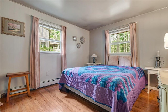 275 Selig Rd, Pocono Lake, PA 18347 - bedroom featuring light wood-type flooring and a baseboard radiator