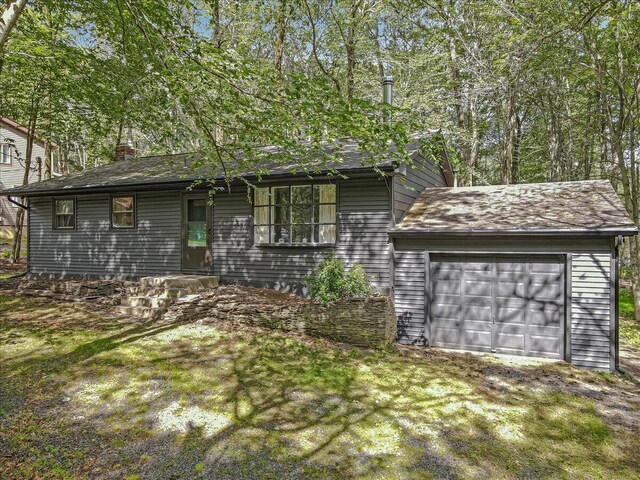 275 Selig Rd, Pocono Lake, PA 18347 - view of front of home with a chimney and roof with shingles