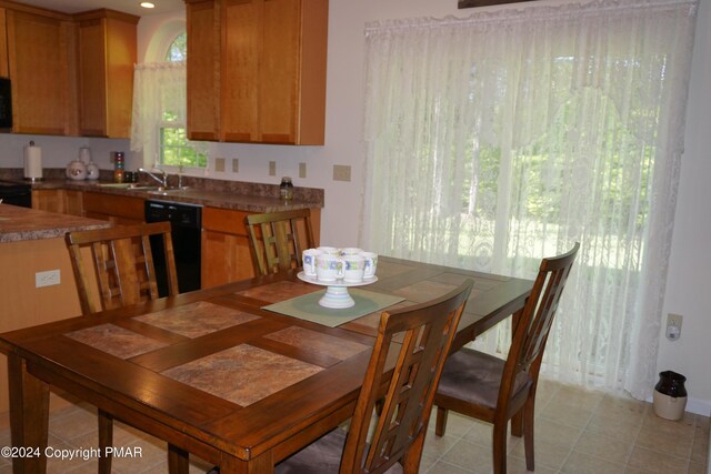 dining space with light tile patterned floors