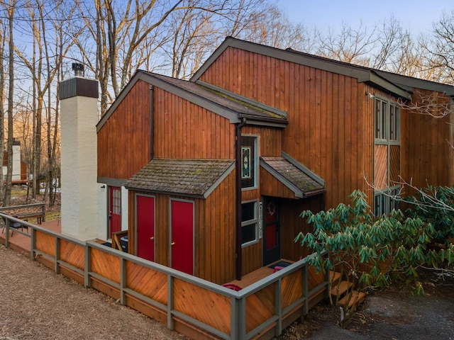 63 Ruffed Grouse Ct, Lake Harmony, PA 18624 - view of property exterior featuring a chimney and fence
