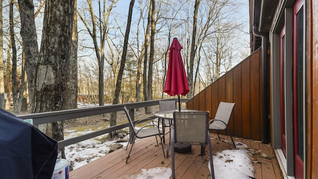 deck featuring outdoor dining area