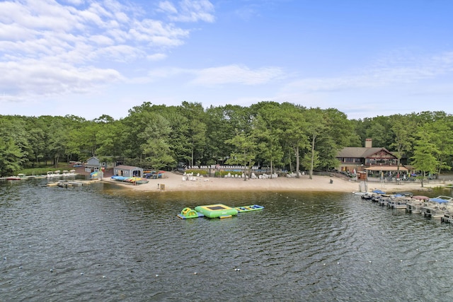 property view of water featuring a view of trees