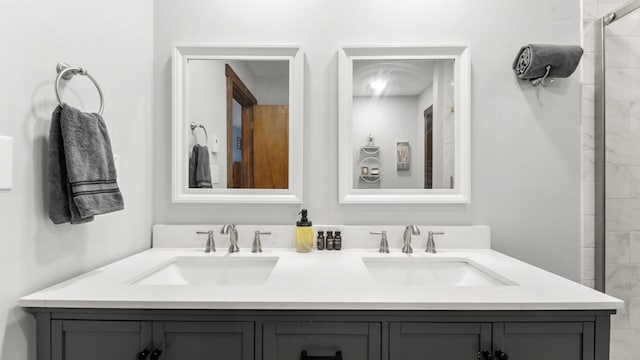 full bath featuring double vanity and a sink