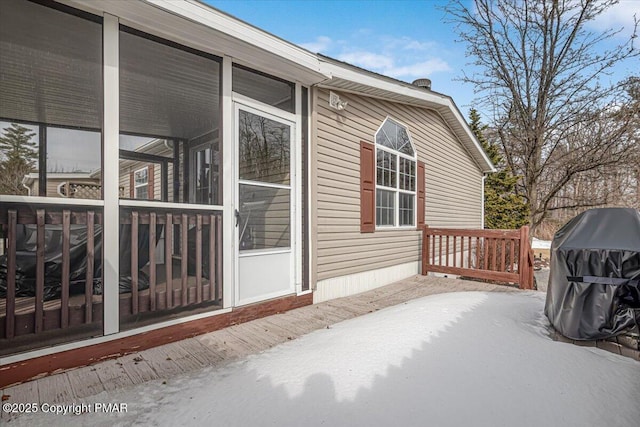 exterior space featuring a sunroom