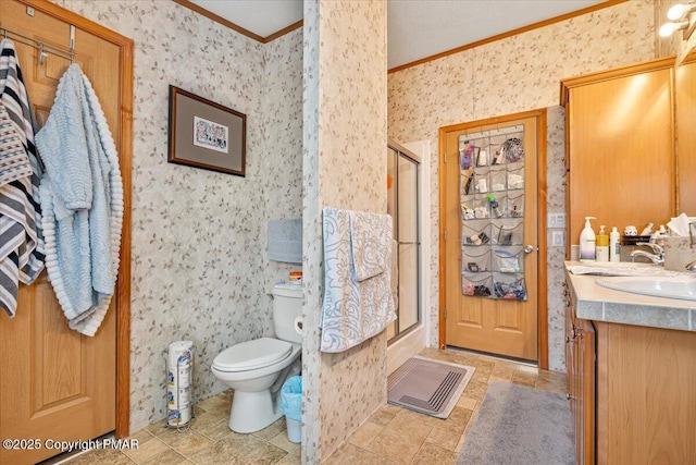 bathroom featuring crown molding, a stall shower, toilet, and wallpapered walls