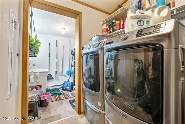 clothes washing area featuring laundry area and separate washer and dryer