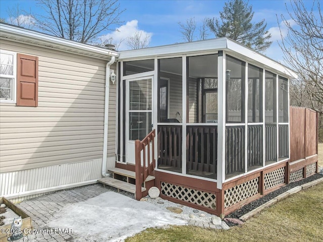 entrance to property with a patio