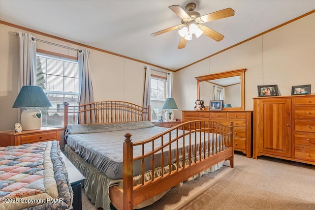 bedroom featuring light carpet, ornamental molding, vaulted ceiling, and a ceiling fan