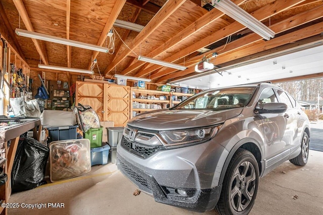 garage featuring a garage door opener