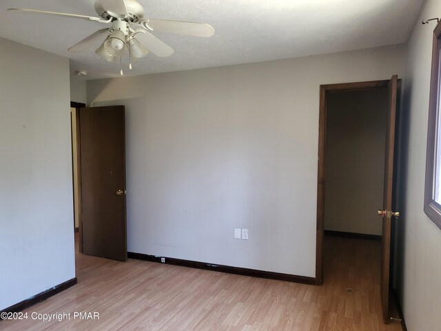 2153 Gravel Rd, Canadensis, PA 18325 - empty room featuring light wood finished floors, ceiling fan, and baseboards