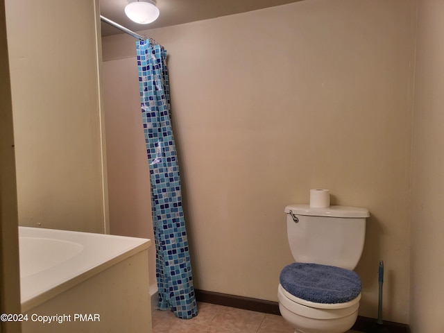2153 Gravel Rd, Canadensis, PA 18325 - bathroom featuring baseboards, tile patterned floors, toilet, and a shower with curtain