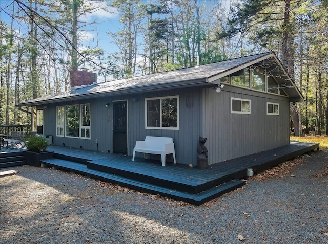 1109 Cedar Knoll Way, Pocono Pines, PA 18350 - view of front facade featuring a chimney and a deck