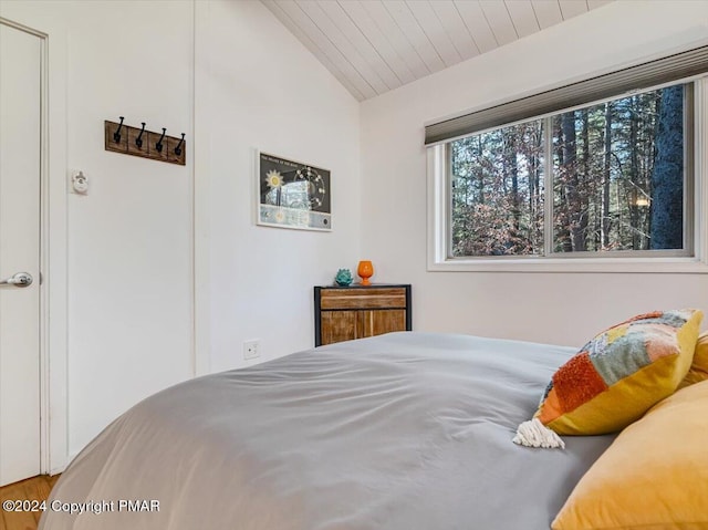 1109 Cedar Knoll Way, Pocono Pines, PA 18350 - bedroom with vaulted ceiling and wood finished floors