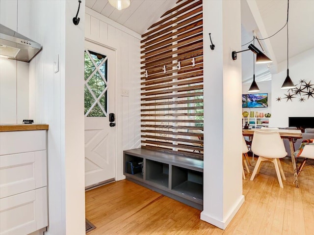 1109 Cedar Knoll Way, Pocono Pines, PA 18350 - mudroom featuring light wood finished floors and lofted ceiling