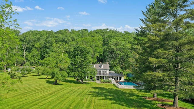 282 Crabapple Ln, East Stroudsburg, PA 18302 - view of grassy yard featuring a wooded view and an outdoor pool