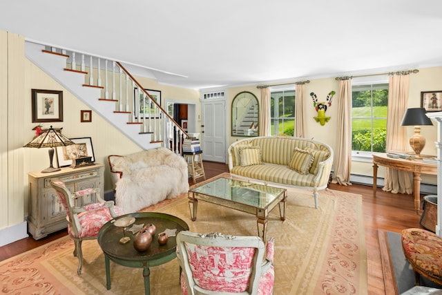 282 Crabapple Ln, East Stroudsburg, PA 18302 - living room with wood finished floors, stairs, and a baseboard heating unit
