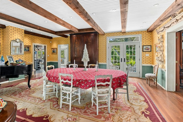 282 Crabapple Ln, East Stroudsburg, PA 18302 - dining area with french doors, light wood-style floors, wainscoting, wallpapered walls, and beamed ceiling
