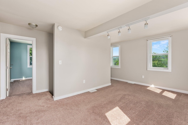 490 Richmond Rd, Bangor, PA 18013 - empty room with rail lighting, light carpet, baseboards, and a smoke detector